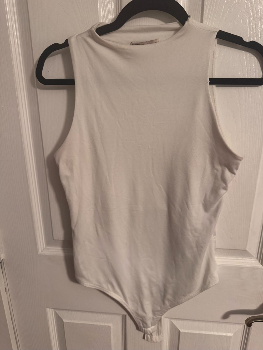Sincerely Jules White Sleeveless High-Neck Bodysuit